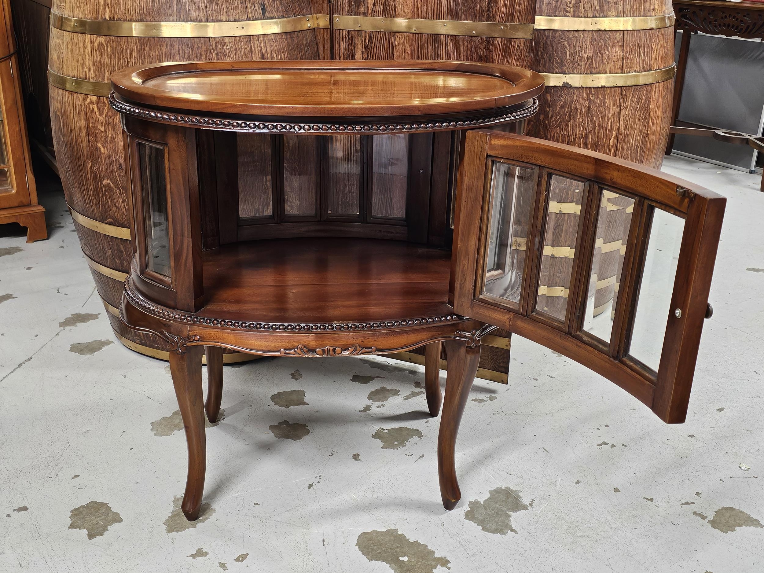 A 19th century style teak drinks or display cabinet fitted with a removable tray top. H.77 W.73cm. - Image 3 of 7