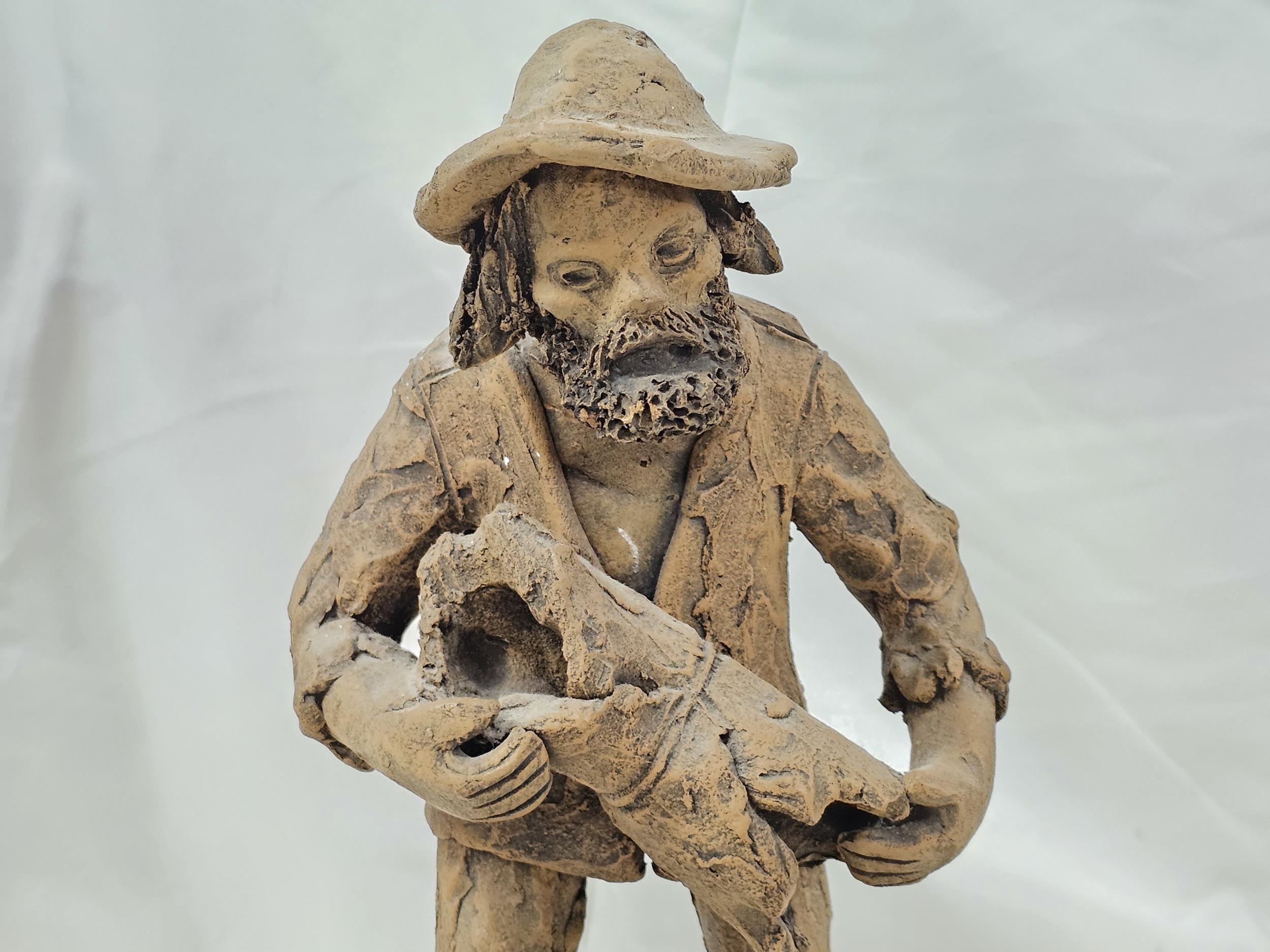 A collection of Columbian and Brazilian figures, including an art pottery figure of an old man, - Image 4 of 4