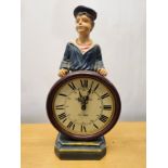 A contemporary moulded clockman type figure. H.46cm.