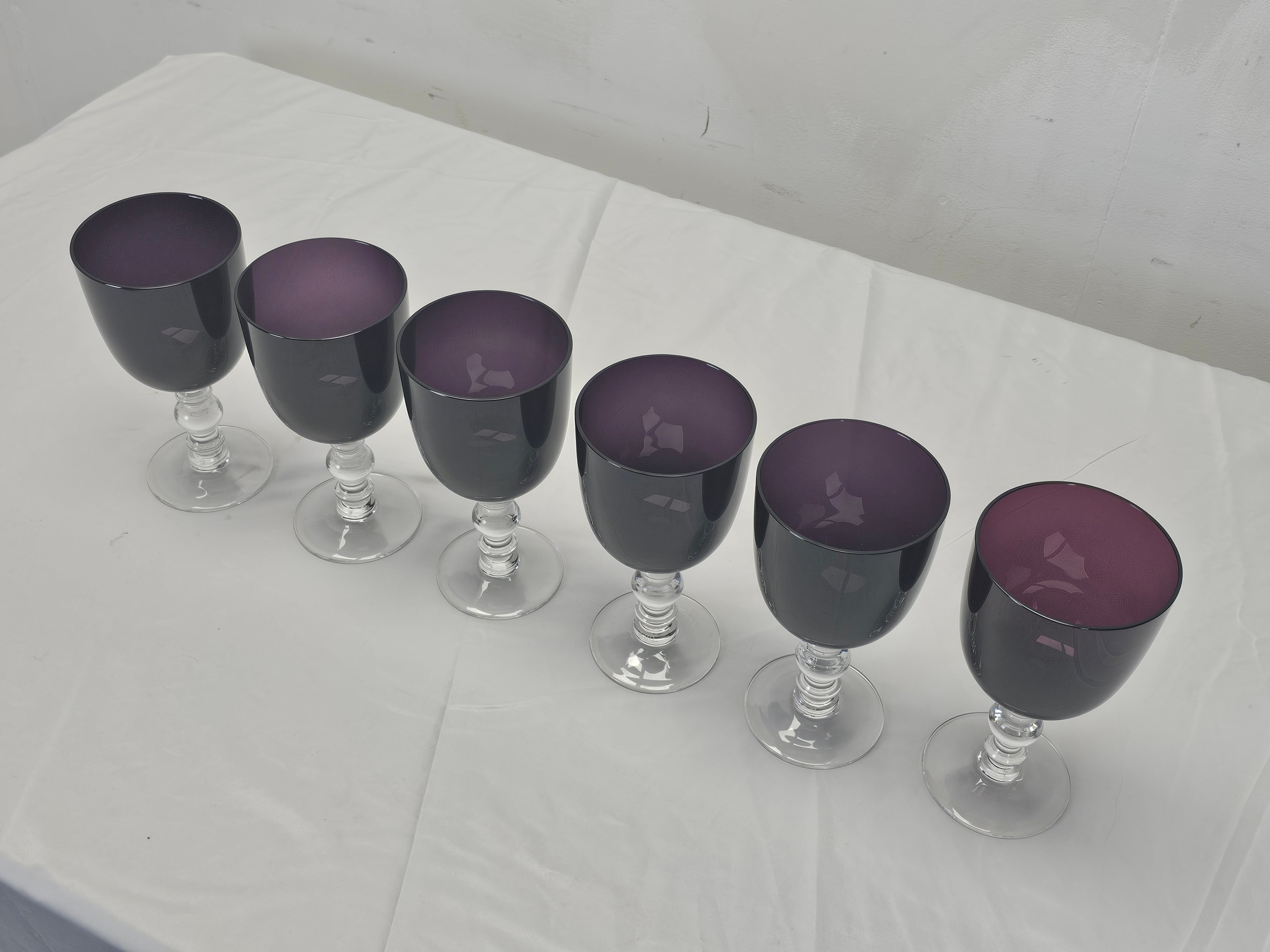 A set of six William Yeoward amethyst coloured crystal wine glasses with clear stems. Note that - Image 2 of 3