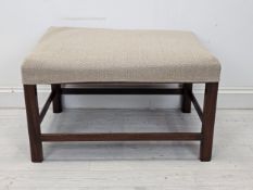 A 19th century mahogany framed footstool. H.42 W.73 W.52cm.