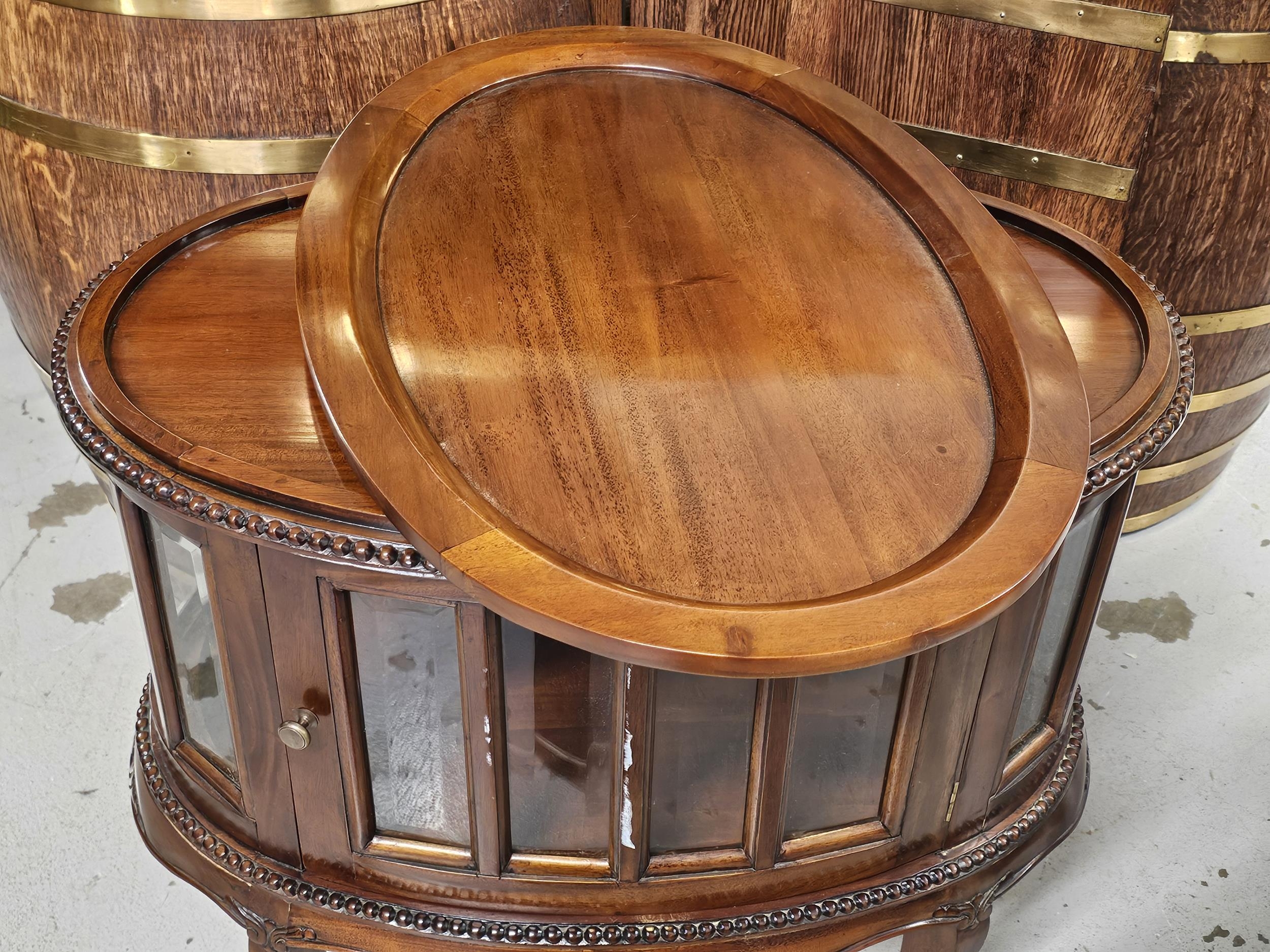 A 19th century style teak drinks or display cabinet fitted with a removable tray top. H.77 W.73cm. - Image 7 of 7