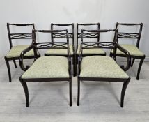 A set of six mahogany Regency style dining chairs.