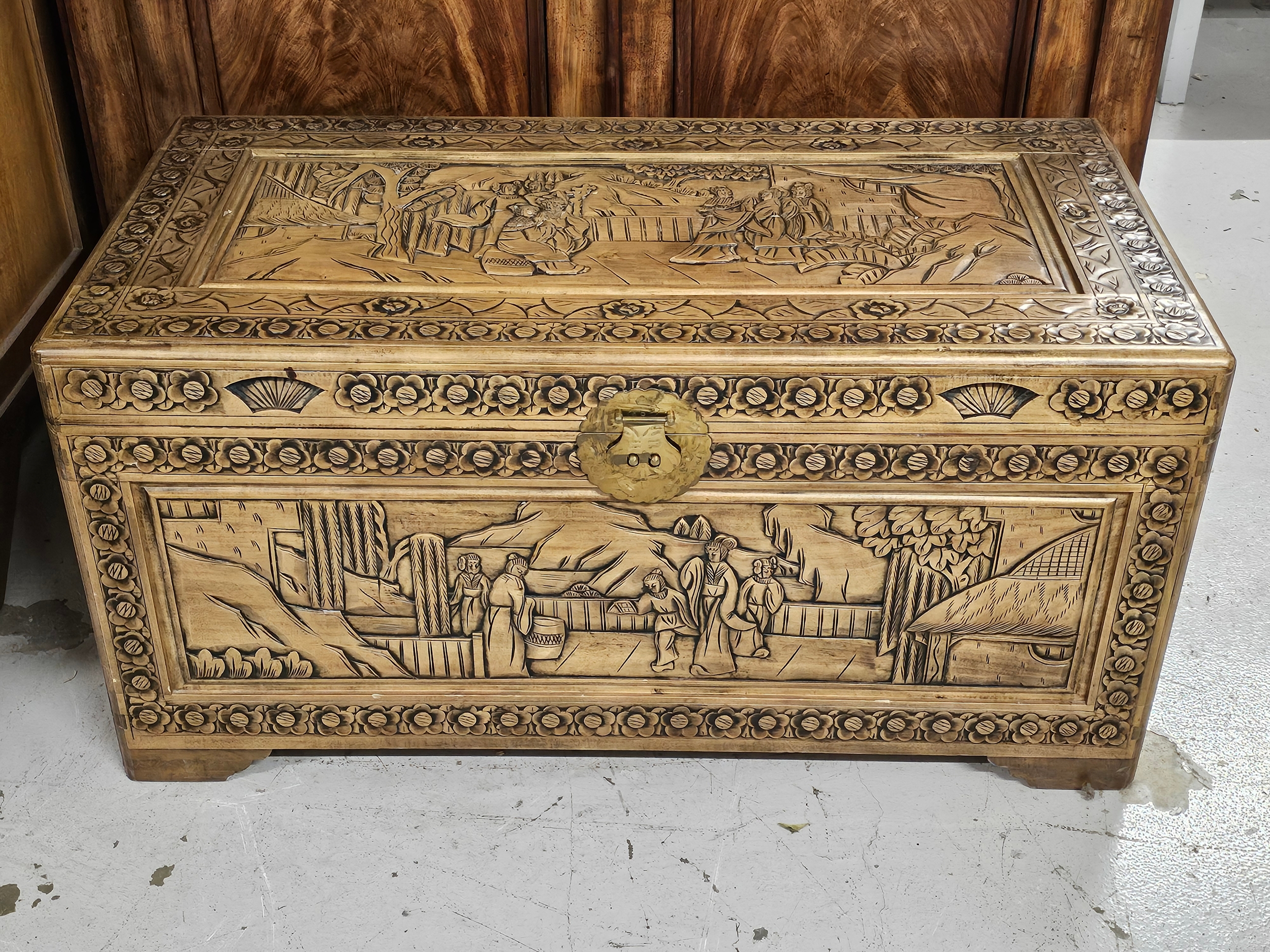 Coffer, early 20th century carved camphorwood. H.52 W.102 D.52cm.