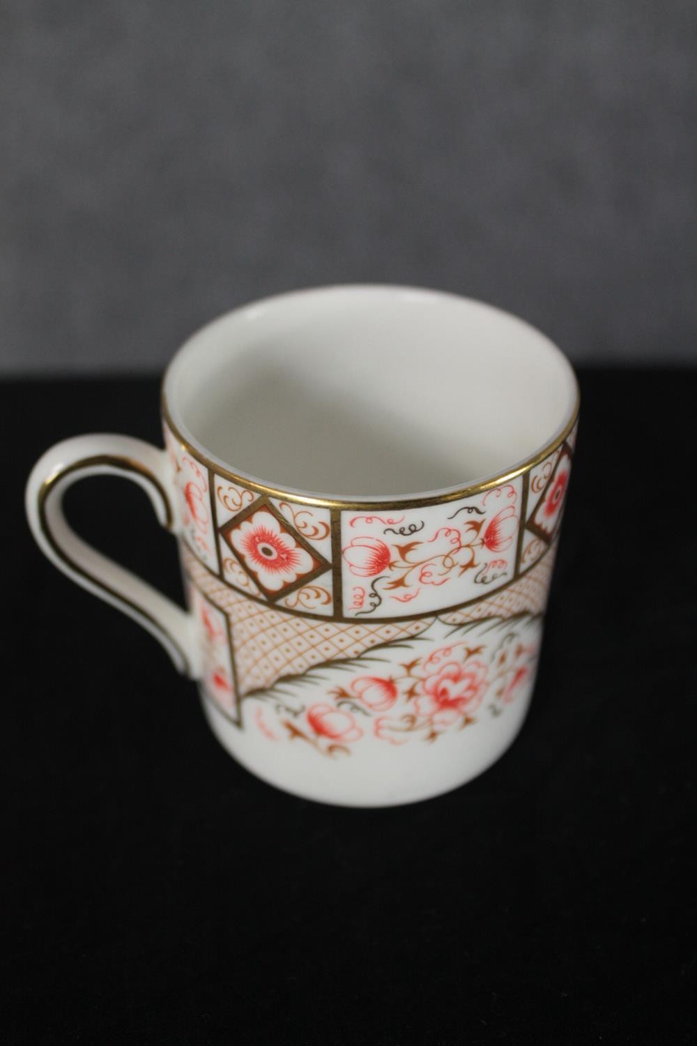 A set of six Royal Grafton china coffee cups and saucers. In a rose and gilt design. Maker's mark to - Image 4 of 5