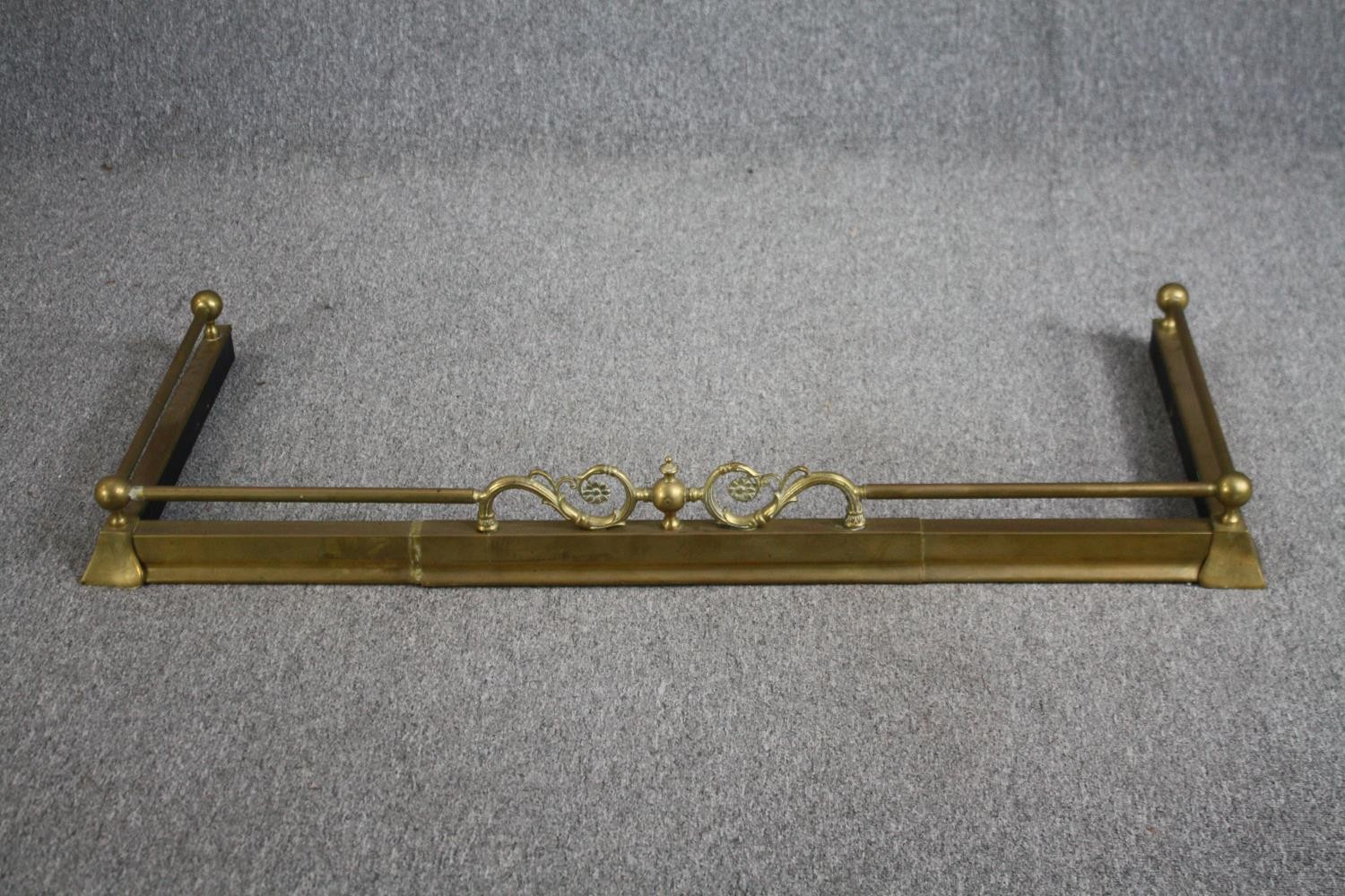 Fire kerb, late 19th century brass. L.130 W.52cm.