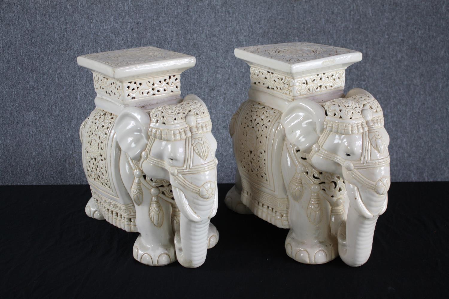 A pair modern oriental style ceramic elephants. Garden stools. H.43cm.