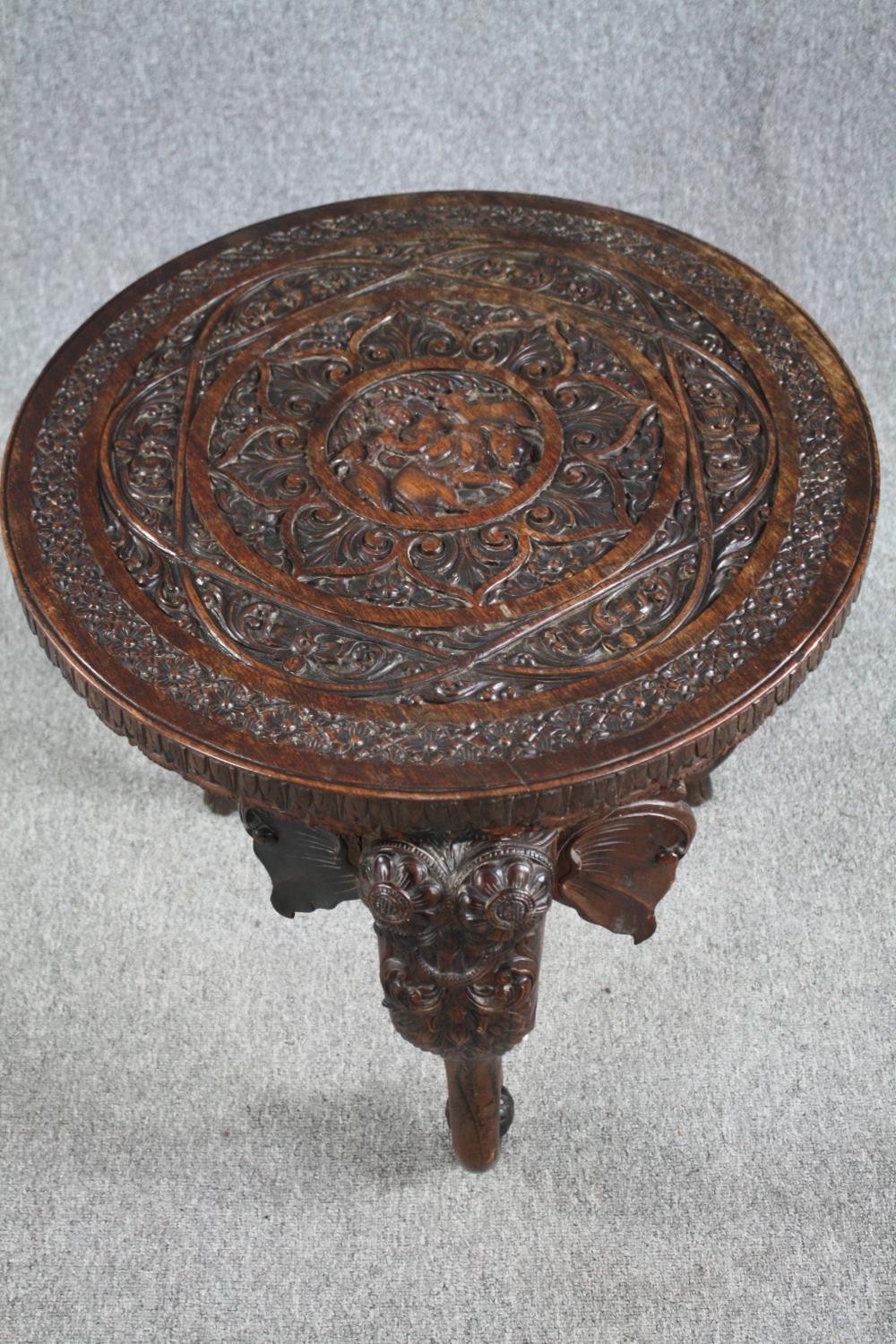 Lamp or occasional table, eastern carved hardwood with elephant supports and bone tusks. H.62 Dia. - Image 2 of 5