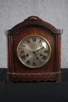 A German HAC mantle clock. In working order but missing its key. H.28 W.25 D.12cm.