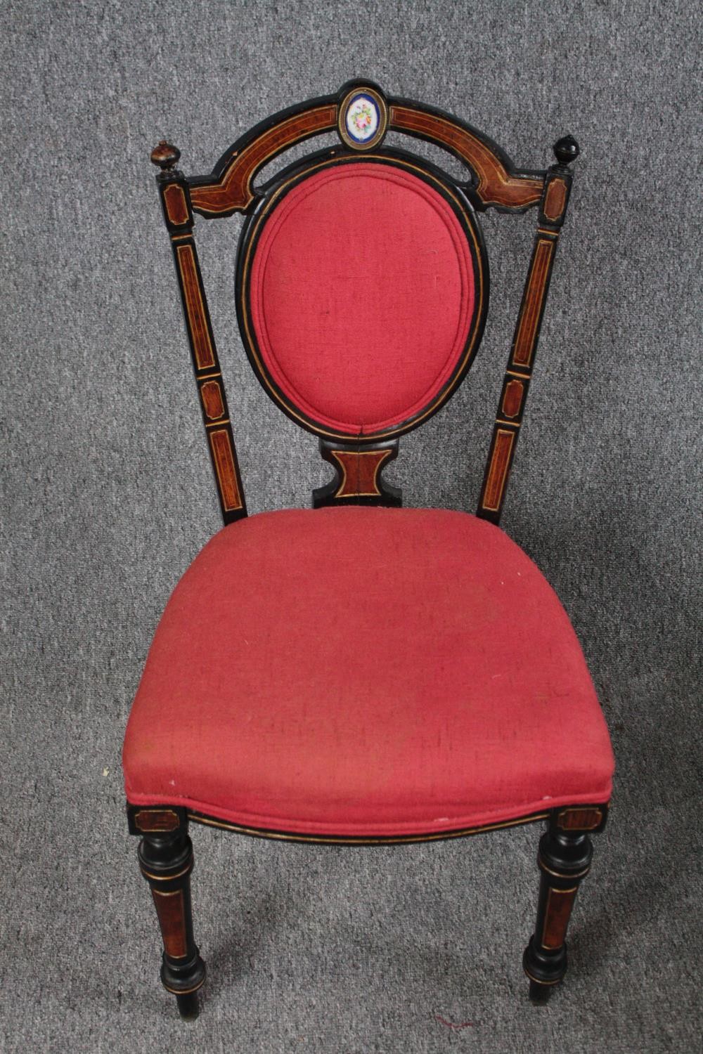 Chairs, a pair, late 19th century amboyna and ebonised with hand painted porcelain medaillon to - Image 2 of 6