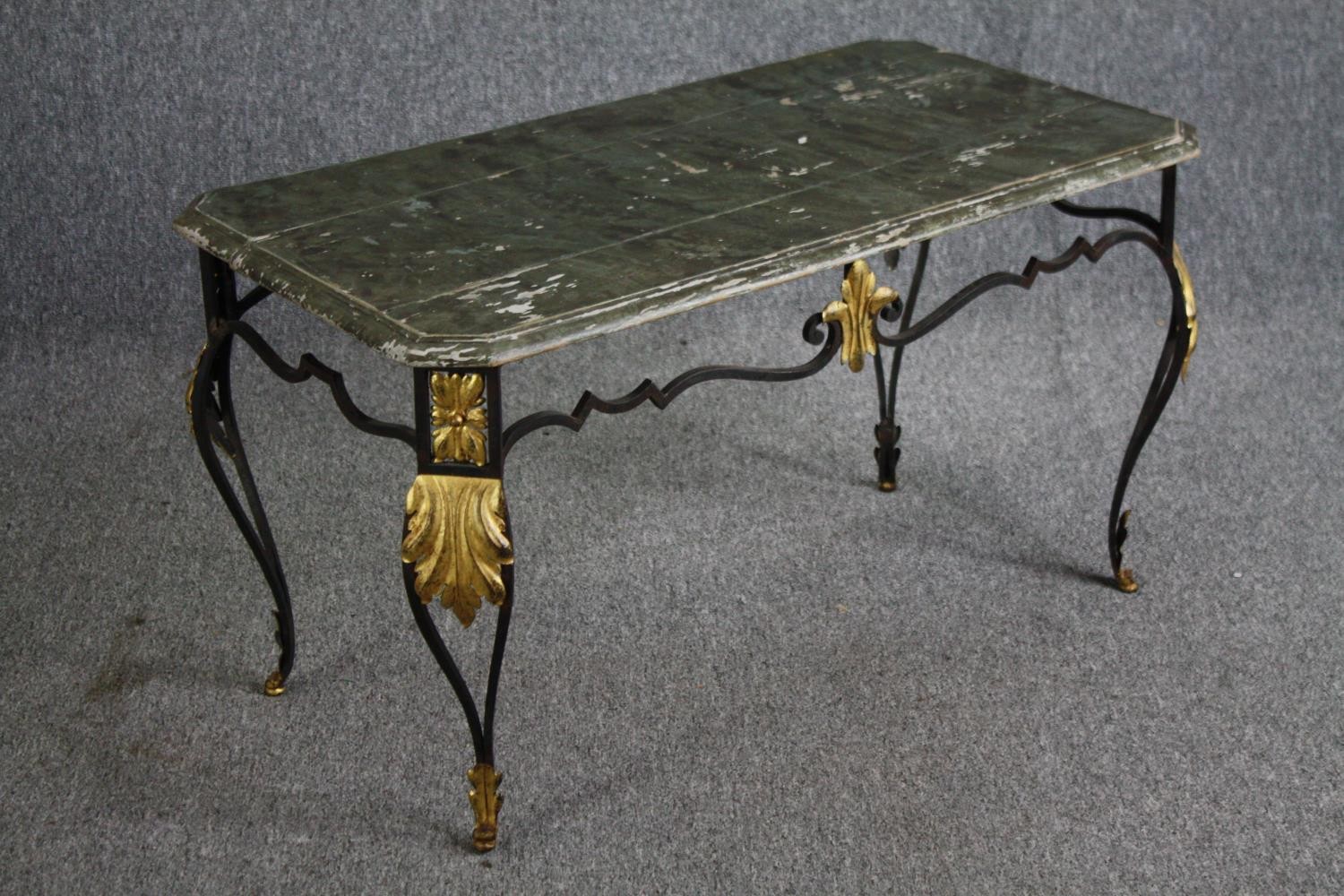 A vintage wrought iron framed coffee table with distressed painted faux marble top. H.50 W.90 D. - Image 3 of 5