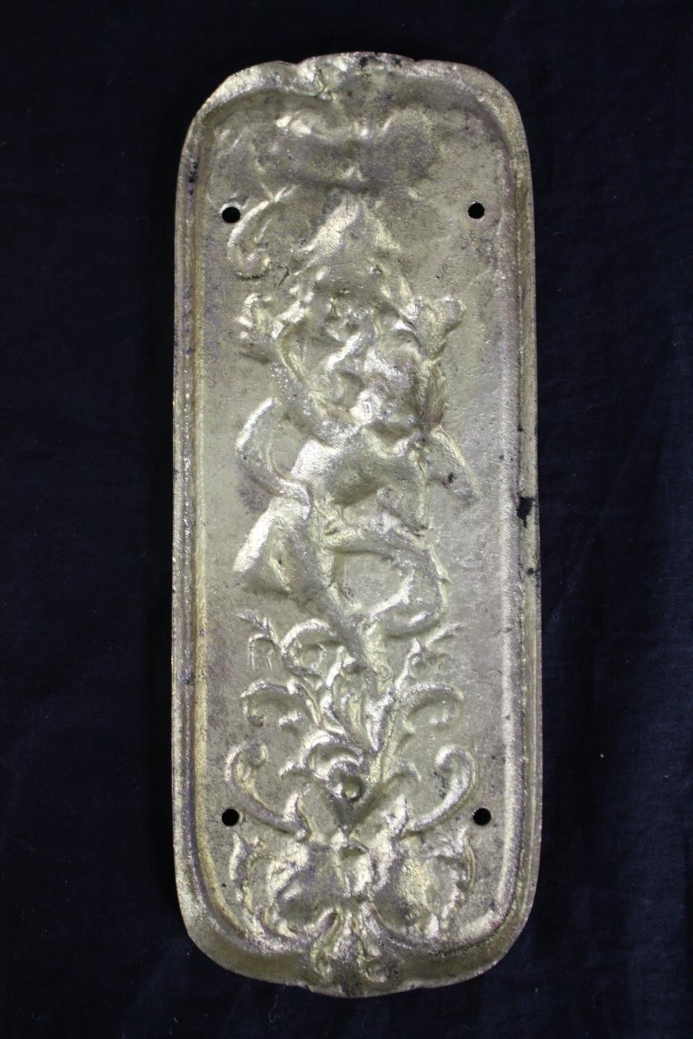 Four brass door plates with repousse cherub design. H.20 W.8cm. (each) - Image 4 of 4