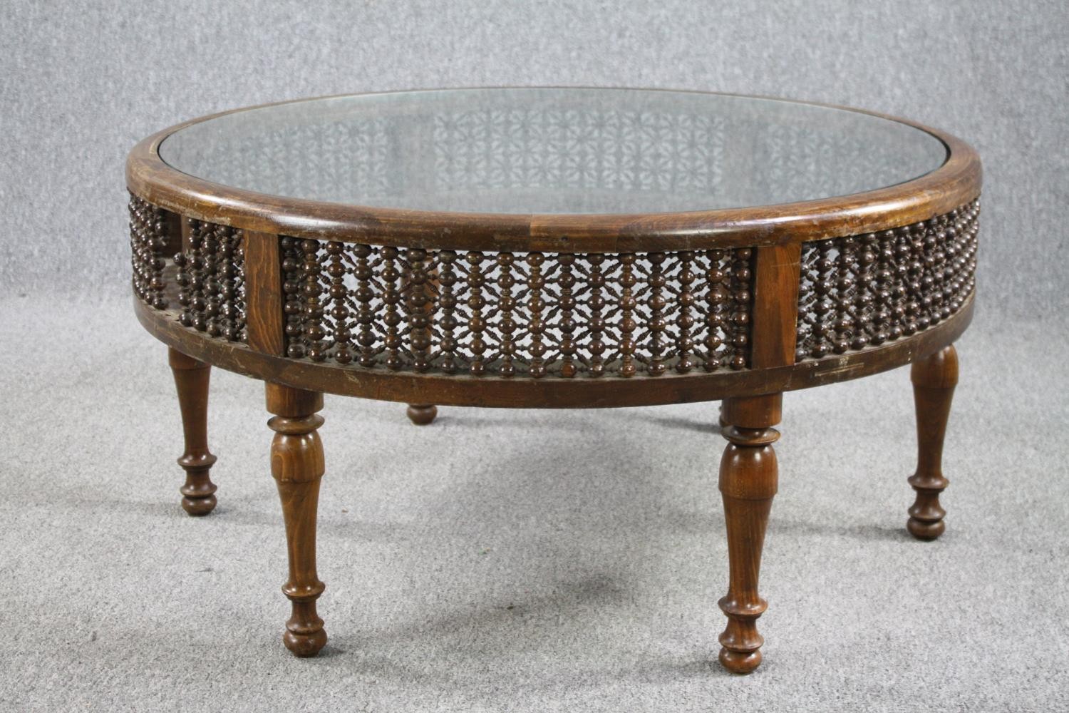 Coffee table, North African style hardwood with plate glass inset top. H.50 Dia.98cm. - Image 2 of 5