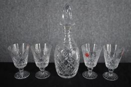 Webb Corbett. A set of four glasses and a decanter. Lead crystal glass. H.29cm. (largest)
