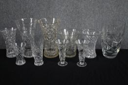 A collection of cut glass vases of various styles. H.26cm. (largest)