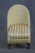 A Lloyd Loom bedroom chair (Makers label on back). H.77cm.