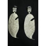 Two chrome feather wall mounted lights. H.28cm. (each)