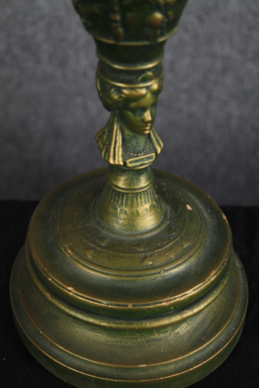 A pair of painted wooden urn design lamps. Decorated with cherubs and a worn greenish gold finish. - Image 4 of 4