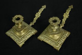 A pair of Victorian brass candleholders H.11cm. (each)