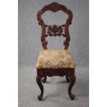 An Eastern carved hardwood side chair. H.118cm.