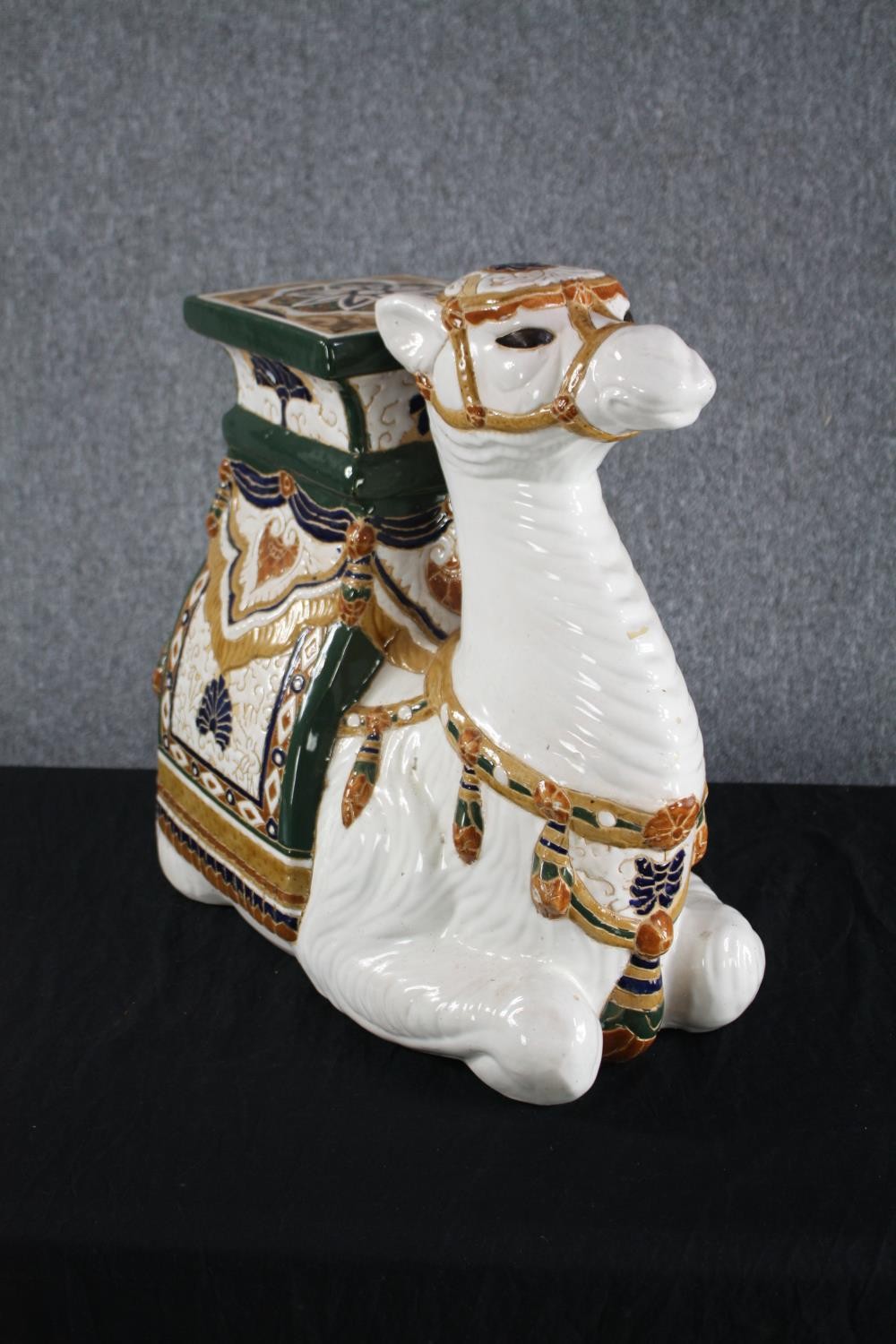 A modern oriental style ceramic Camel garden stool. Hand painted and well detailed. H.49cm. - Image 3 of 4