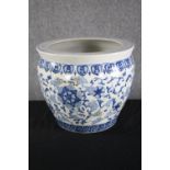 A blue and white ceramic planter. H.35cm.