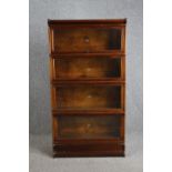 Bookcase, C.1900 mahogany Globe Wernicke in four sections. H.161 W.37 D.32cm.