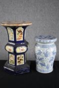 Two modern oriental style ceramic garden stools. Hand painted and decorated with carp. H.41cm. H.