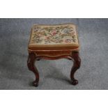 A mid Victorian stool with original tapestry seat on carved mahogany cabriole supports. H.46 W.44