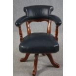 Desk chair, 19th century oak swivel and tilt action in leather upholstery. H.82cm.