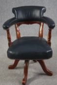 Desk chair, 19th century oak swivel and tilt action in leather upholstery. H.82cm.