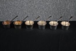 Six miniature silver plated pans. H.3cm. (each)
