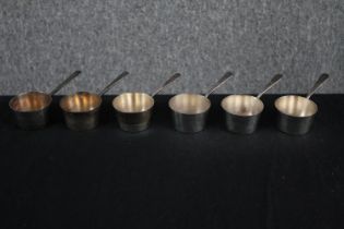 Six miniature silver plated pans. H.3cm. (each)