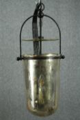 A glass storm lantern style ceiling light with a distressed glass shade. H.58cm.