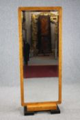 Dressing mirror, Biedermeier burr maple full height with bevelled plate on later block feet. H.161