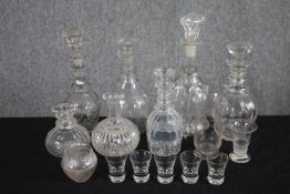 A mixed collection of 19th century blown glass decanters, jelly glasses and shot glasses. H.35cm. (