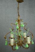 A Murano green milk glass chandelier. Early 20th century with five branches of lights. H.53cm.