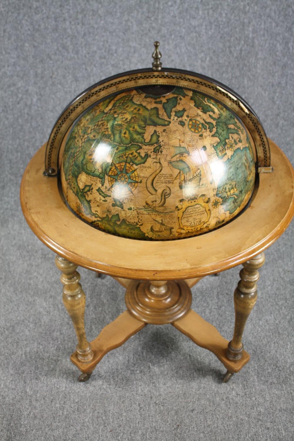 A drinks cabinet in the form of a globe with a fitted interior on a turned beech stand. H.100 Dia. - Image 2 of 8