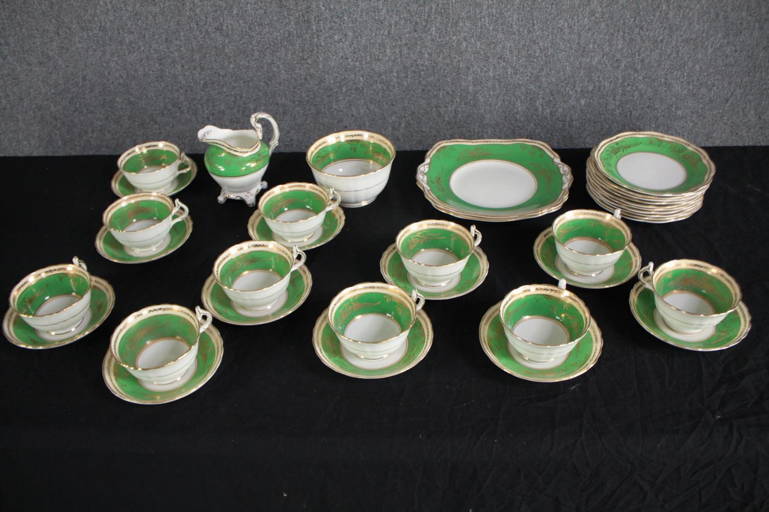 A German porcelain tea set for eleven people. 1930s Konig teacup & saucer, plates and creamer. In - Image 2 of 11