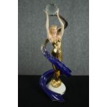 Franklin Mint. Porcelain figurine. Galaxy in Gold. H.36cm.