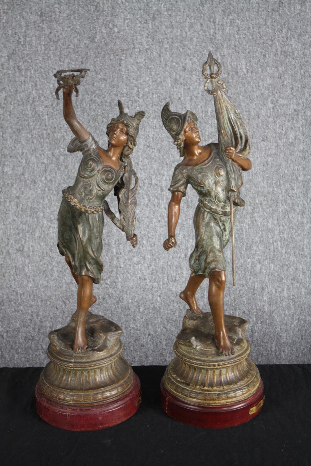 Two bronze effect spelter figures. A patinated allegory of War and Peace. On wooden bases. H.58cm ( - Image 2 of 6