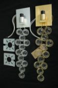 Two decorative pendant wall lights complete with their wall mounts. L.54cm. (each)