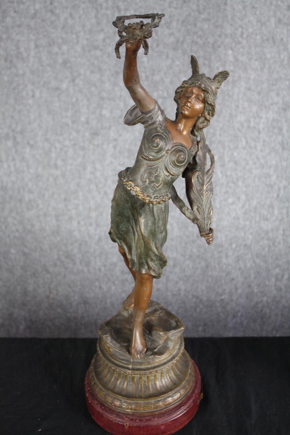 Two bronze effect spelter figures. A patinated allegory of War and Peace. On wooden bases. H.58cm ( - Image 3 of 6