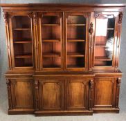 A mid 19th century mahogany breakfront library bookcase. H.234 W.242 D.48cm. (Comes in four sections