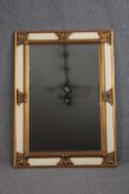 A large contemporary 19th century continental style wall mirror in gilt and painted frame. H.116 W.