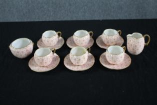 Grainger's Worcester Porcelain. Six cups and saucers, one creamer, and a sugar bowl. Each with a