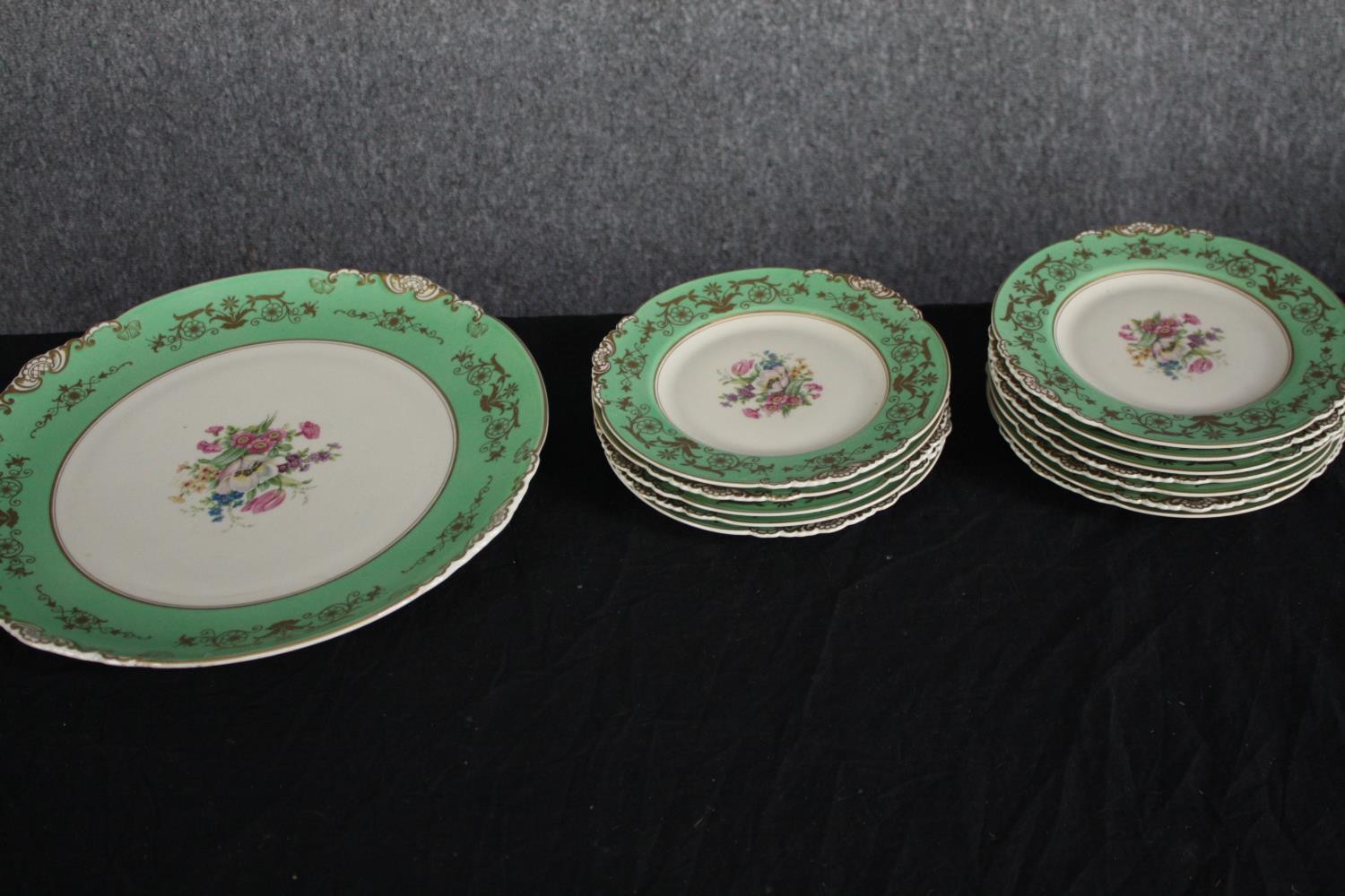 A German porcelain tea set for eleven people. 1930s Konig teacup & saucer, plates and creamer. In - Image 8 of 11