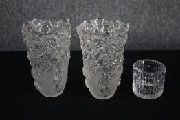 Two crystal glass vases and a small cup. H.16cm. (largest)