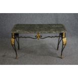 A vintage wrought iron framed coffee table with distressed painted faux marble top. H.50 W.90 D.