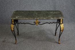 A vintage wrought iron framed coffee table with distressed painted faux marble top. H.50 W.90 D.